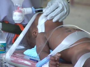 Intubated Septic Baby Strapped to a Living Room Chair - Haiti Earthquake 2010